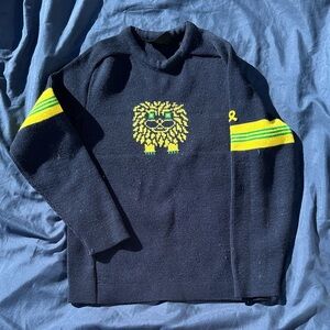 Demeter Ski Sweater Navy Blue Lion Sweater with Yellow Accents Lion